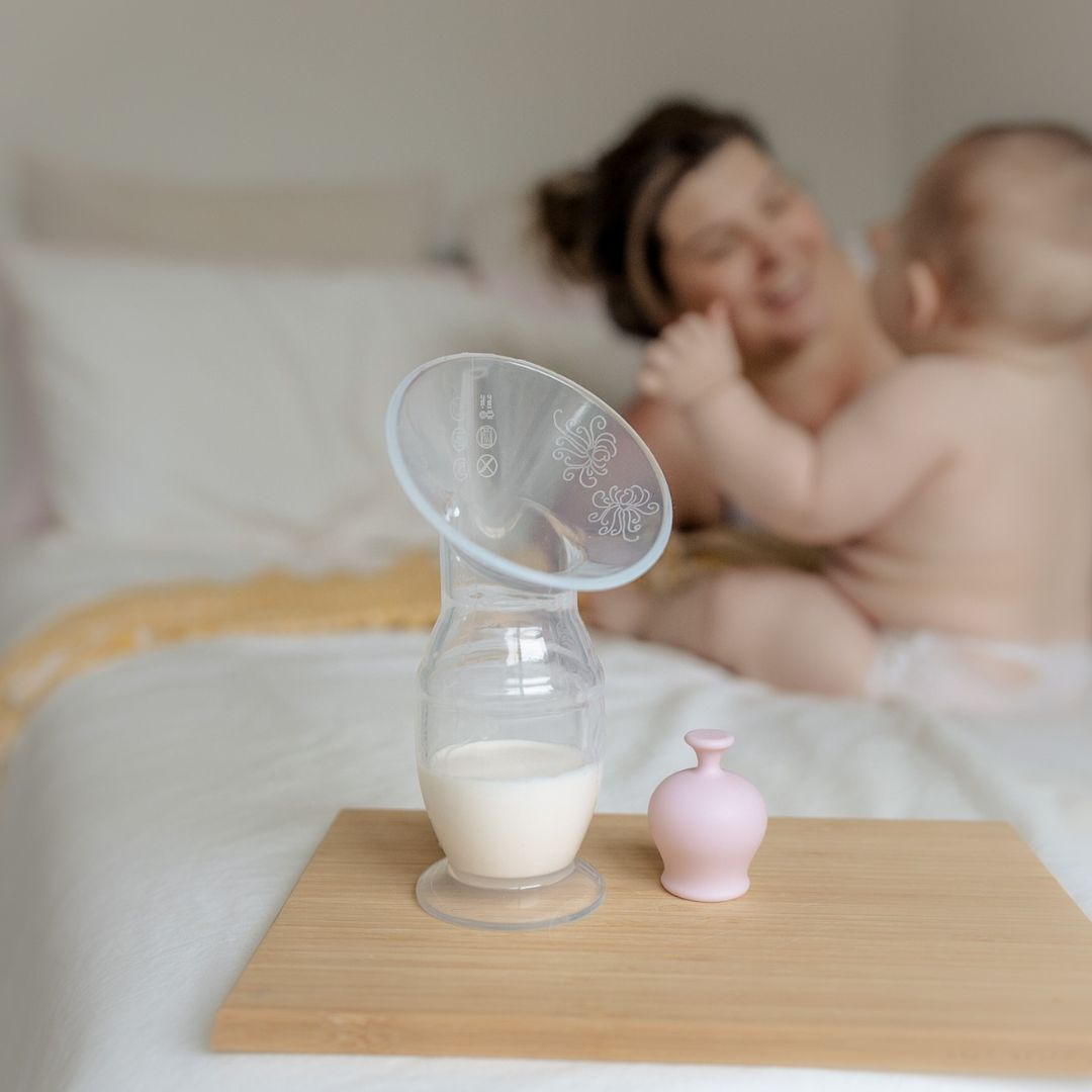Hand held silicone breast pump